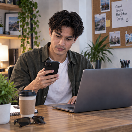Man recording his mobile phone IMEI while registering the device online